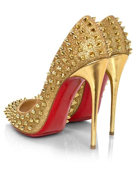 christian louboutin gold spiked shoes.